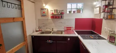 Cuisine ou kitchenette dans l'établissement Logement - Proche Gare SNCF & Bus