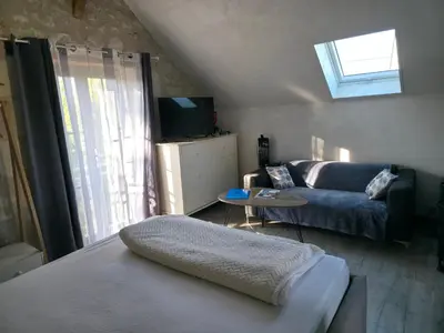 Un ou plusieurs lits dans un hébergement de l'établissement Gite indépendant des Caves