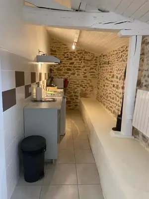Cuisine ou kitchenette dans l'établissement Le clos de Tilio