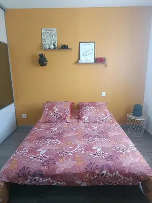 Un ou plusieurs lits dans un hébergement de l'établissement Chambre d'Hôtes