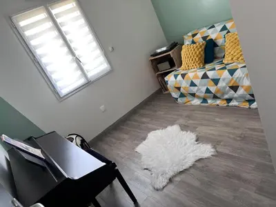 Coin salon dans l'établissement Chambre d'Hôtes