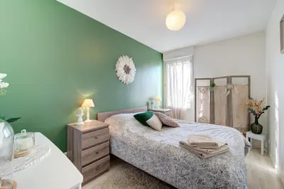 Un ou plusieurs lits dans un hébergement de l'établissement Appartement Cocooning