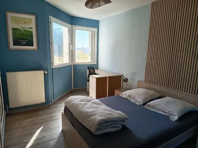 Un ou plusieurs lits dans un hébergement de l'établissement Grand appartement T2 cosy 4 personnes Proche Tours Centre