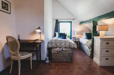 Un ou plusieurs lits dans un hébergement de l'établissement Clos du Maraicher Villandry