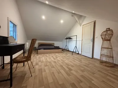 Un ou plusieurs lits dans un hébergement de l'établissement Maison 1930 Familiale à la Marbellière, 2 chambres