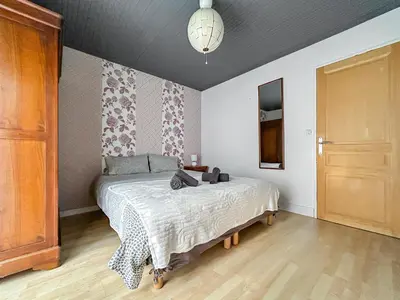Un ou plusieurs lits dans un hébergement de l'établissement La maison Tinoli Escapade tranquille près d'Angers