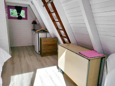 Un ou plusieurs lits dans un hébergement de l'établissement La Rossignolerie - Cabane aux oiseaux