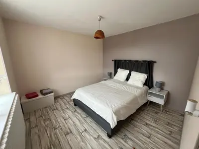 Un ou plusieurs lits dans un hébergement de l'établissement Maison de campagne entre Le Mans et Tours
