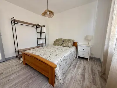 Un ou plusieurs lits dans un hébergement de l'établissement Charmante maison calme proche gare TGV Saint-Pierre-des-Corps