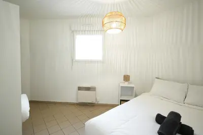 Un ou plusieurs lits dans un hébergement de l'établissement Appartement hyper centre ville