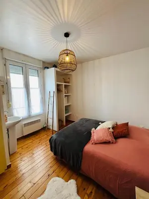 Un ou plusieurs lits dans un hébergement de l'établissement Appartement 2 pièces