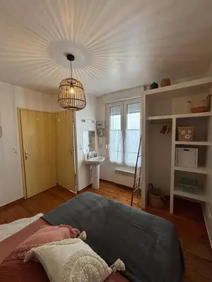 Un ou plusieurs lits dans un hébergement de l'établissement Appartement 2 pièces