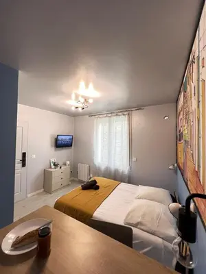 Un ou plusieurs lits dans un hébergement de l'établissement Studio Lisbonne - Plein centre-ville refait à neuf avec parking gratuit