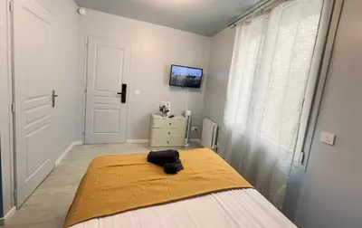 Un ou plusieurs lits dans un hébergement de l'établissement Studio Lisbonne - Plein centre-ville refait à neuf avec parking gratuit