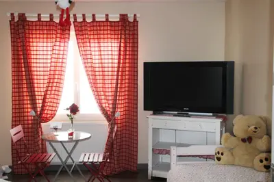 Télévision ou salle de divertissement dans l'établissement L'Alsacienne