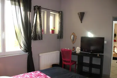 Télévision ou salle de divertissement dans l'établissement L'Alsacienne