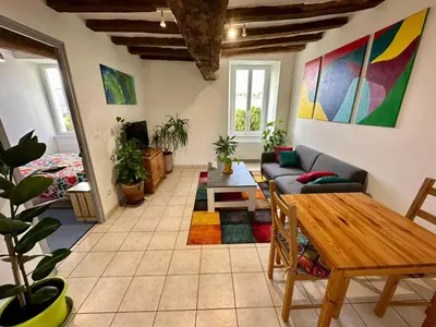 Coin salon dans l'établissement APT Iere ETAGE PARKING PRIVE AVEC GARAGE MOTO VELO