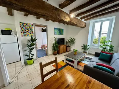 Cuisine ou kitchenette dans l'établissement APT Iere ETAGE PARKING PRIVE AVEC GARAGE MOTO VELO