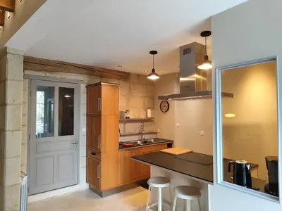 Cuisine ou kitchenette dans l'établissement Logis troglodyte cosy & vue sur la Loire