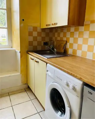 Cuisine ou kitchenette dans l'établissement Maison de campagne sarthoise