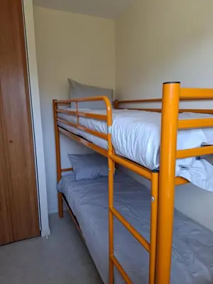 Un ou plusieurs lits dans un hébergement de l'établissement Cottage Rubens 11 2chambres calme