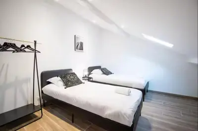 Un ou plusieurs lits dans un hébergement de l'établissement La Maison Renaissance Amboise 4 bedroom house