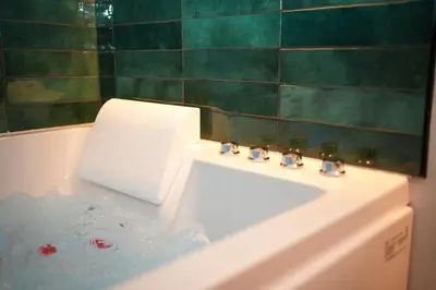 Salle de bains dans l'établissement Suite romantique avec Spa