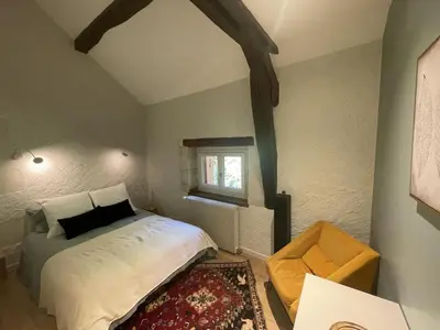 Un ou plusieurs lits dans un hébergement de l'établissement Gîte de charme, jardin privé, proche Tours, animaux admis - FR-1-381-637