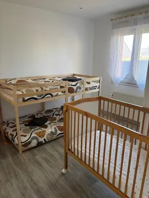 Un ou plusieurs lits dans un hébergement de l'établissement Chez Jerome et carole