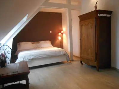Un ou plusieurs lits dans un hébergement de l'établissement Maison Chauvin