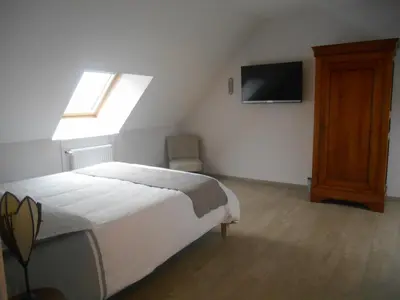 Un ou plusieurs lits dans un hébergement de l'établissement Maison Chauvin