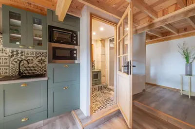 Cuisine ou kitchenette dans l'établissement Gite de la Ferme du Château 2 - Studio Climatisé