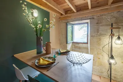 Coin salon dans l'établissement Gite de la Ferme du Château 2 - Studio Climatisé