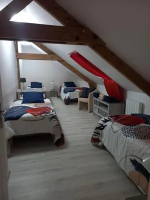 Un ou plusieurs lits dans un hébergement de l'établissement Maison au bord de l'eau