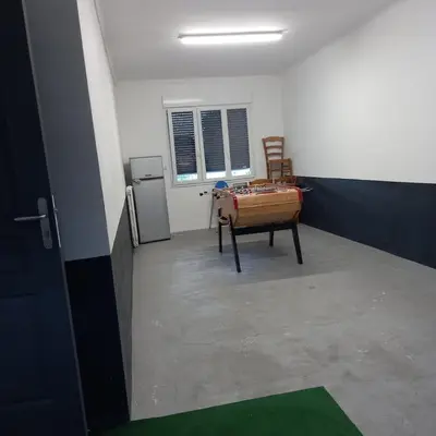 Coin salon dans l'établissement Maison au bord de l'eau