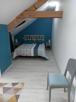 Un ou plusieurs lits dans un hébergement de l'établissement Maison au bord de l'eau