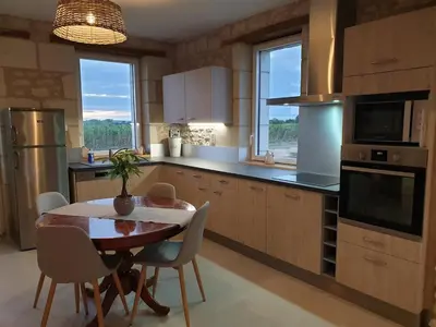 Cuisine ou kitchenette dans l'établissement La Petite Loge des Vignes Private Jacuzzi