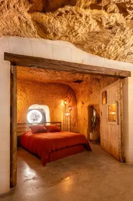 Un ou plusieurs lits dans un hébergement de l'établissement Le Cavernacle