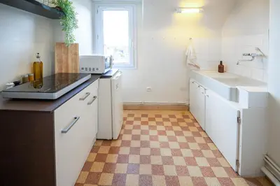 Cuisine ou kitchenette dans l'établissement L'Écrin Saumurois - T3 Confort et Charme Île Offard