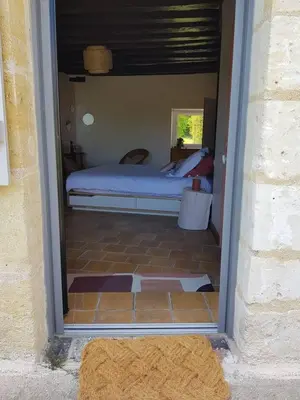 Un ou plusieurs lits dans un hébergement de l'établissement Le Clos Julo - Studio cosy à la campagne avec piscine