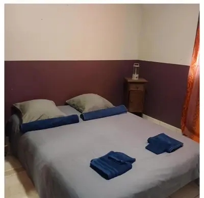 Un ou plusieurs lits dans un hébergement de l'établissement Appartement Cosy