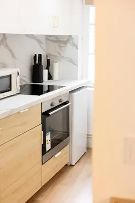 Cuisine ou kitchenette dans l'établissement Le Velours - Centre Ville - Calme - Cosy