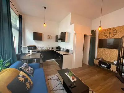 Cuisine ou kitchenette dans l'établissement Duplex lumineux centre-ville