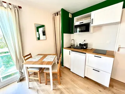 Cuisine ou kitchenette dans l'établissement Cocooning appartement