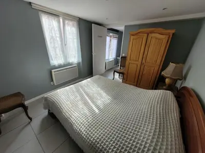 Un ou plusieurs lits dans un hébergement de l'établissement Gite chez Matos maison entière avec 3 chambres et grande cour pour animaux admis