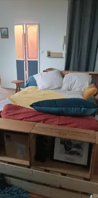 Un ou plusieurs lits dans un hébergement de l'établissement L'Escale Au coin de la rue