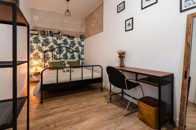 Un ou plusieurs lits dans un hébergement de l'établissement La Casa Maje hypercentre Vendôme