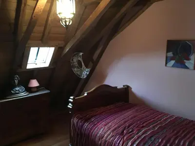 Un ou plusieurs lits dans un hébergement de l'établissement Chateau de Lassay - Charming castle for rent in Sarthe