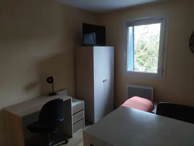 Un ou plusieurs lits dans un hébergement de l'établissement T1 cosy 2 personnes à Tours Sud
