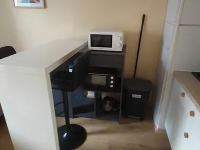 Cuisine ou kitchenette dans l'établissement T1 cosy 2 personnes à Tours Sud